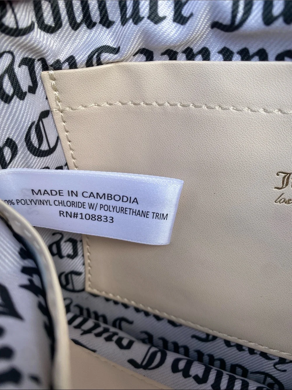 Juicy Couture Brown Logo Wristlet with Bow Detail